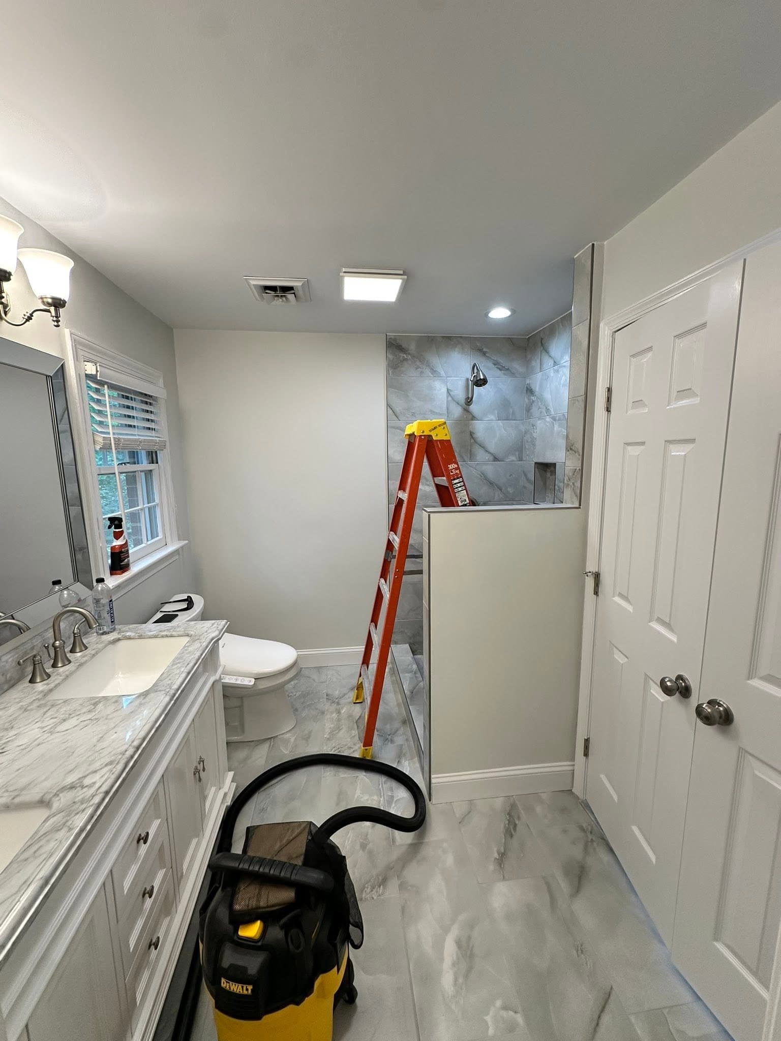 Marble shower remodel in progress by Newman's Plumbing near Virginia Beach, VA