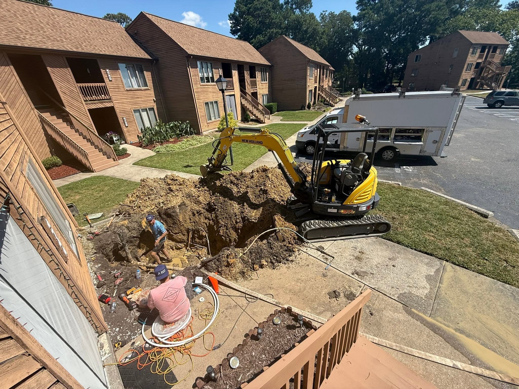 Underground water line excavation by Newman's Plumbing at a North Suffolk, VA property